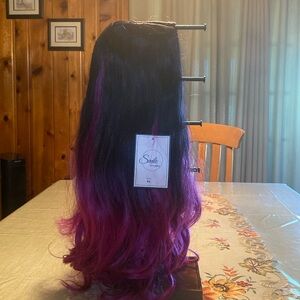 Women’s Halloween wig.  Never worn.  Black and Purple.